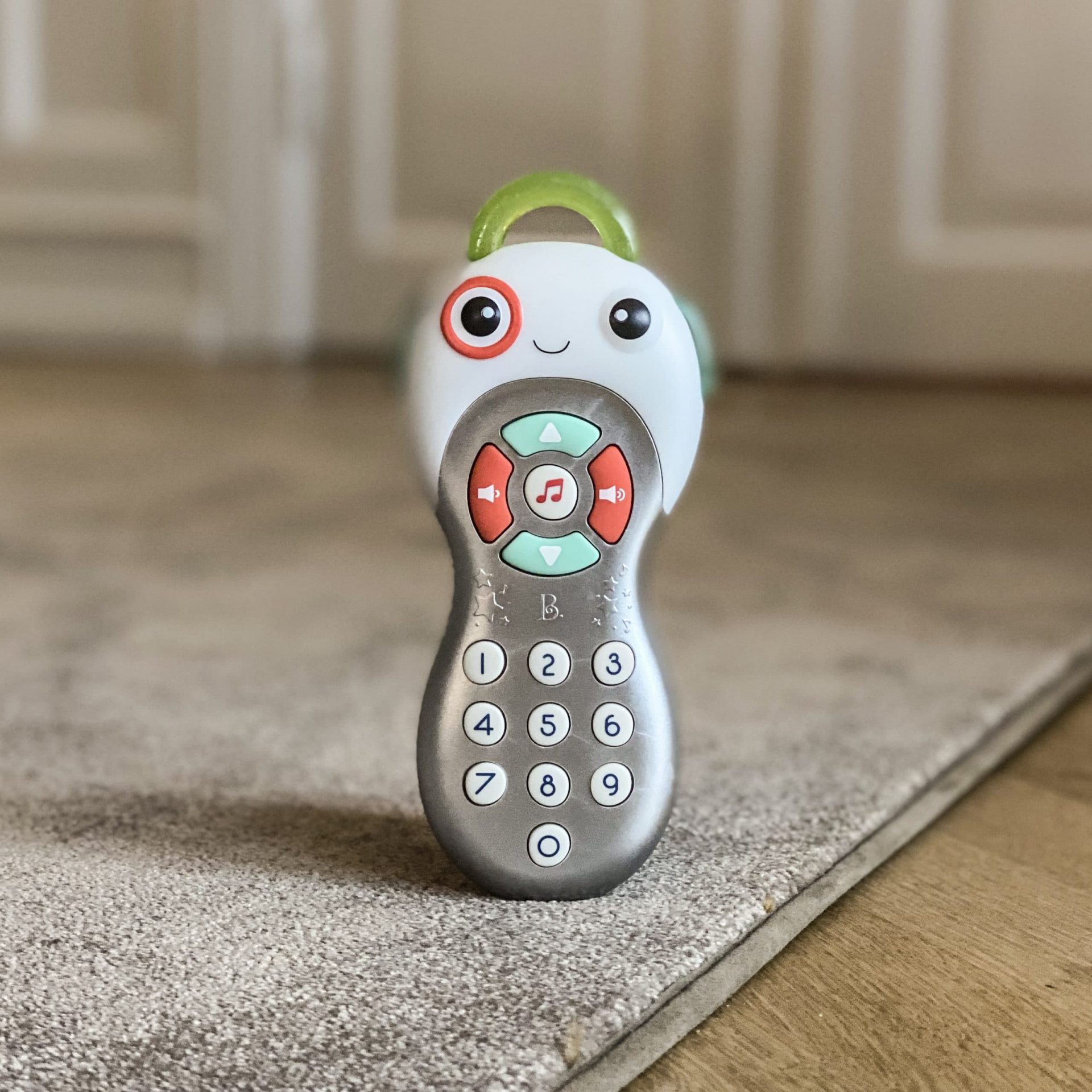Grab & zap baby remote control B Toys Legetøj