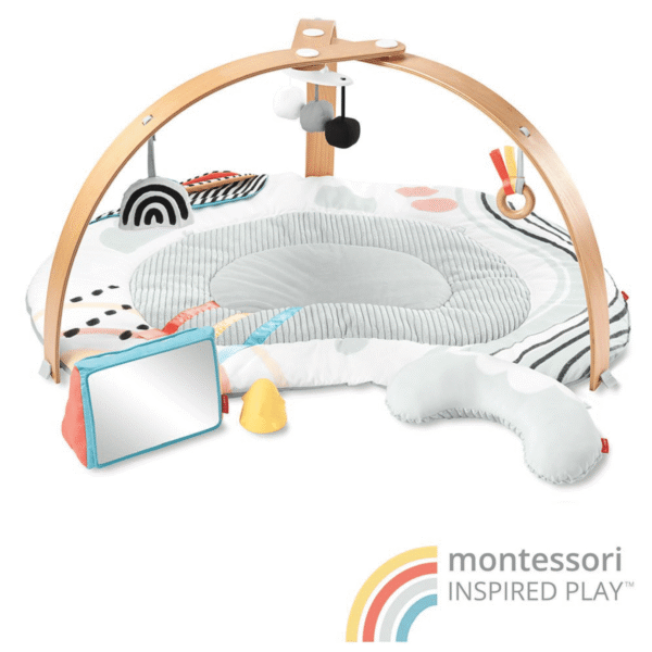 a baby play mat with a mirror and toys- Discoverosity Babygym - Skip Hop