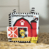 baby einstein BE-17303 Counting at the Farm™ blød aktivitetsbog